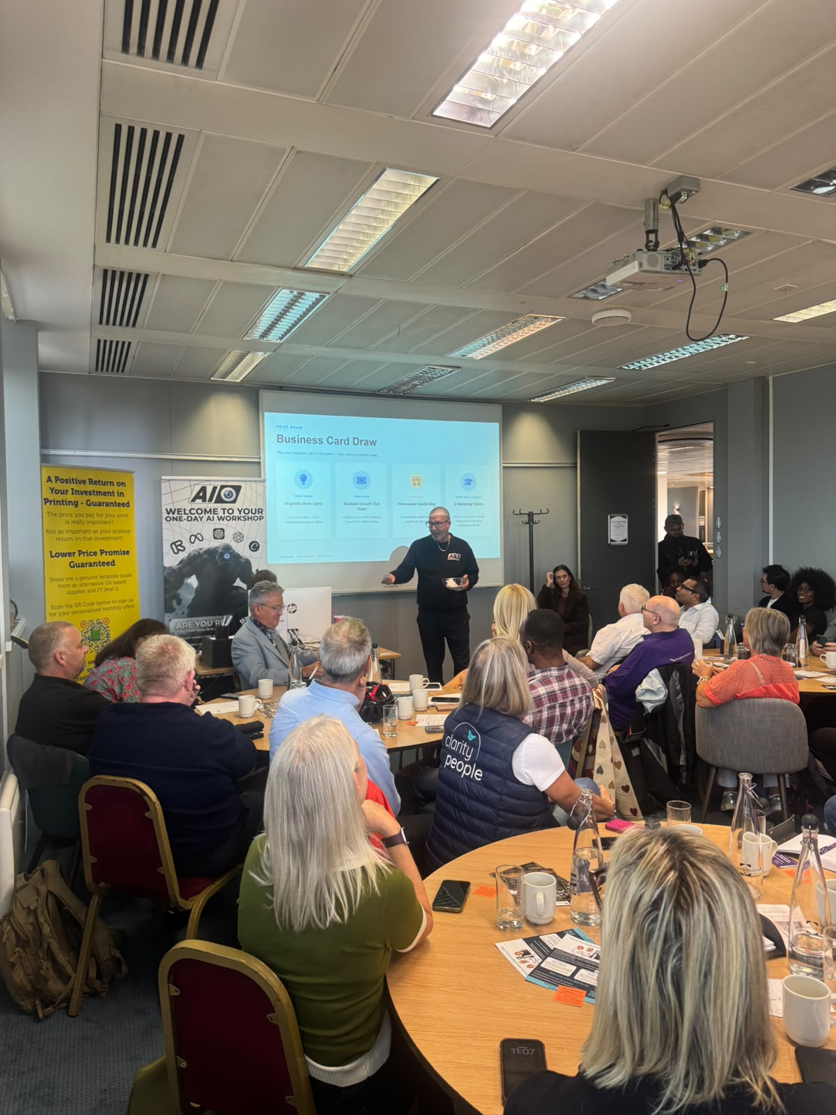 A full room of attendees enjoying an AI Cyclops Business Club event