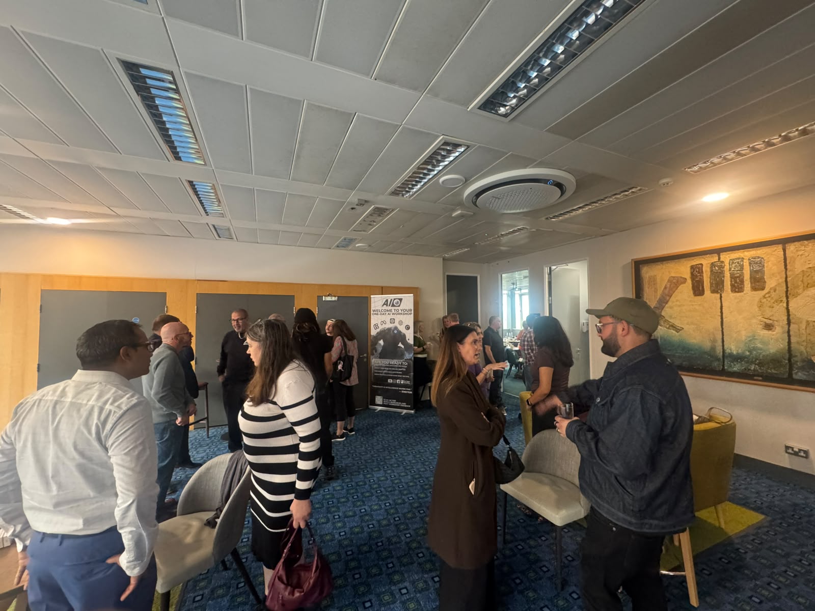 Guests talking and exchanging ideas at the Business Club