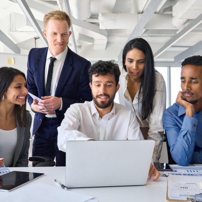 Busy,Diverse,Professional,Business,People,Executives,Looking,At,Laptop,In